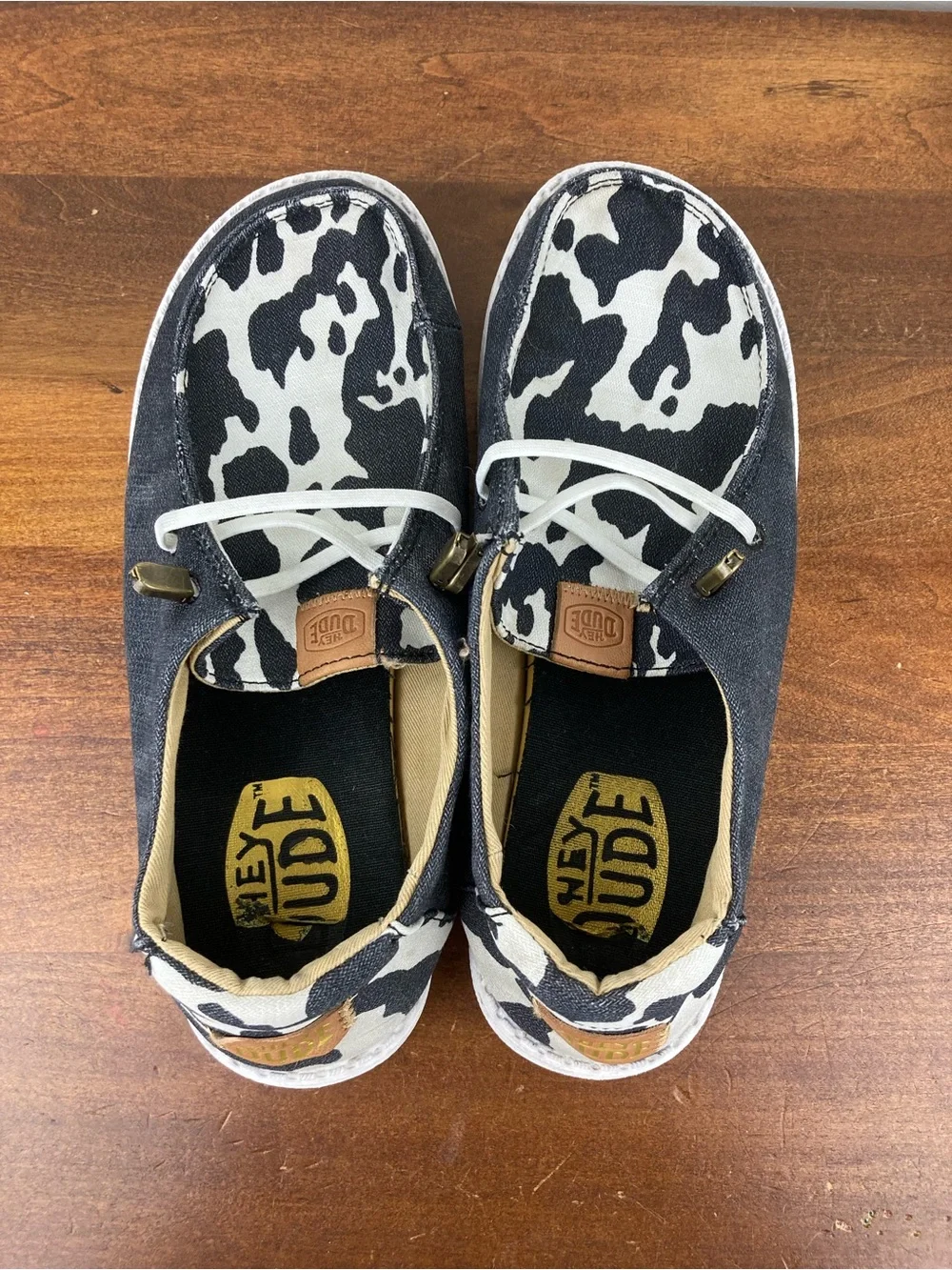 Hey Dude Wendy Animal Black Cow Print Slip-On Shoes 41037-0HO Women's Size 6.
